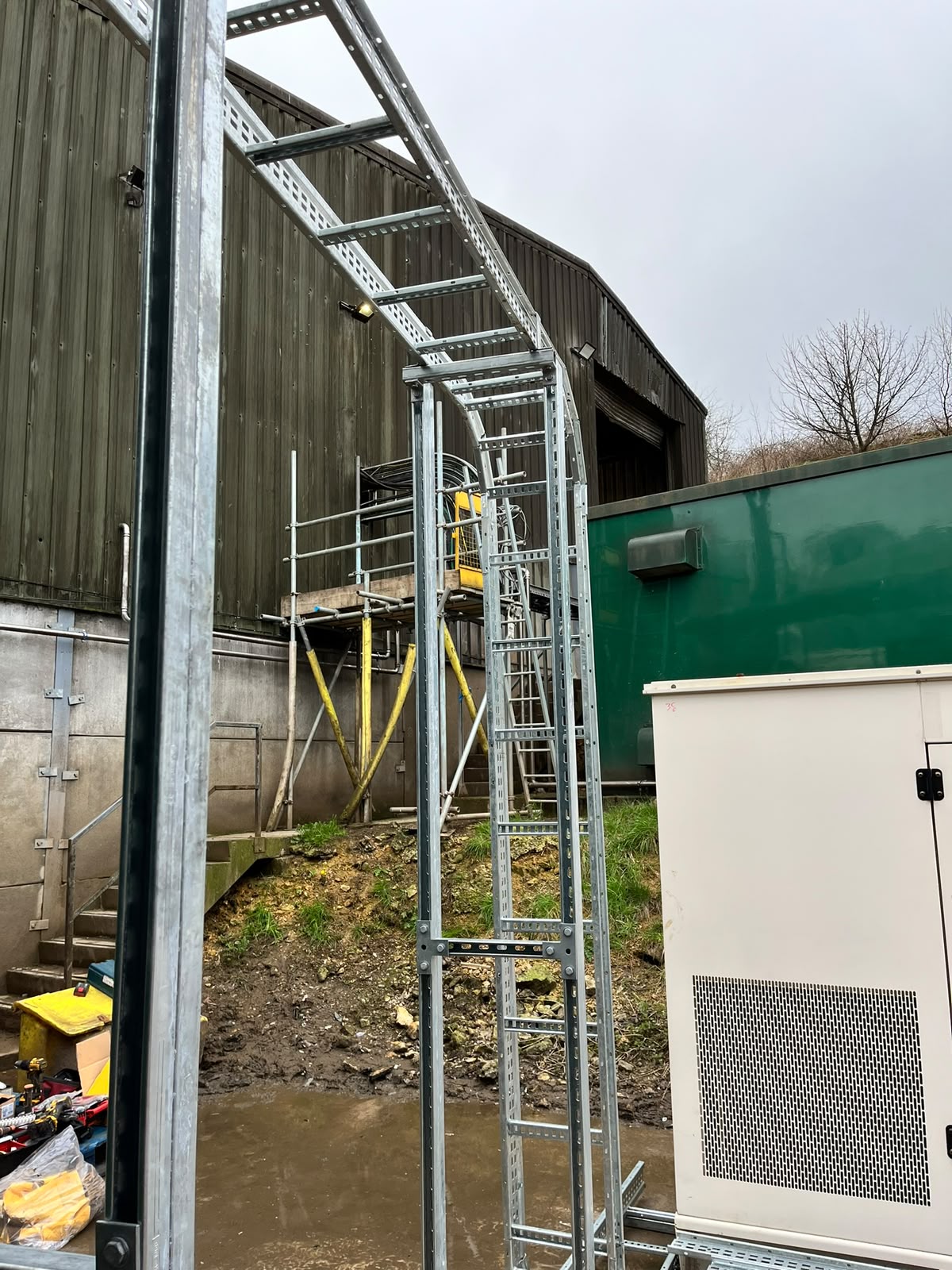 Power cables secured within low-level containment