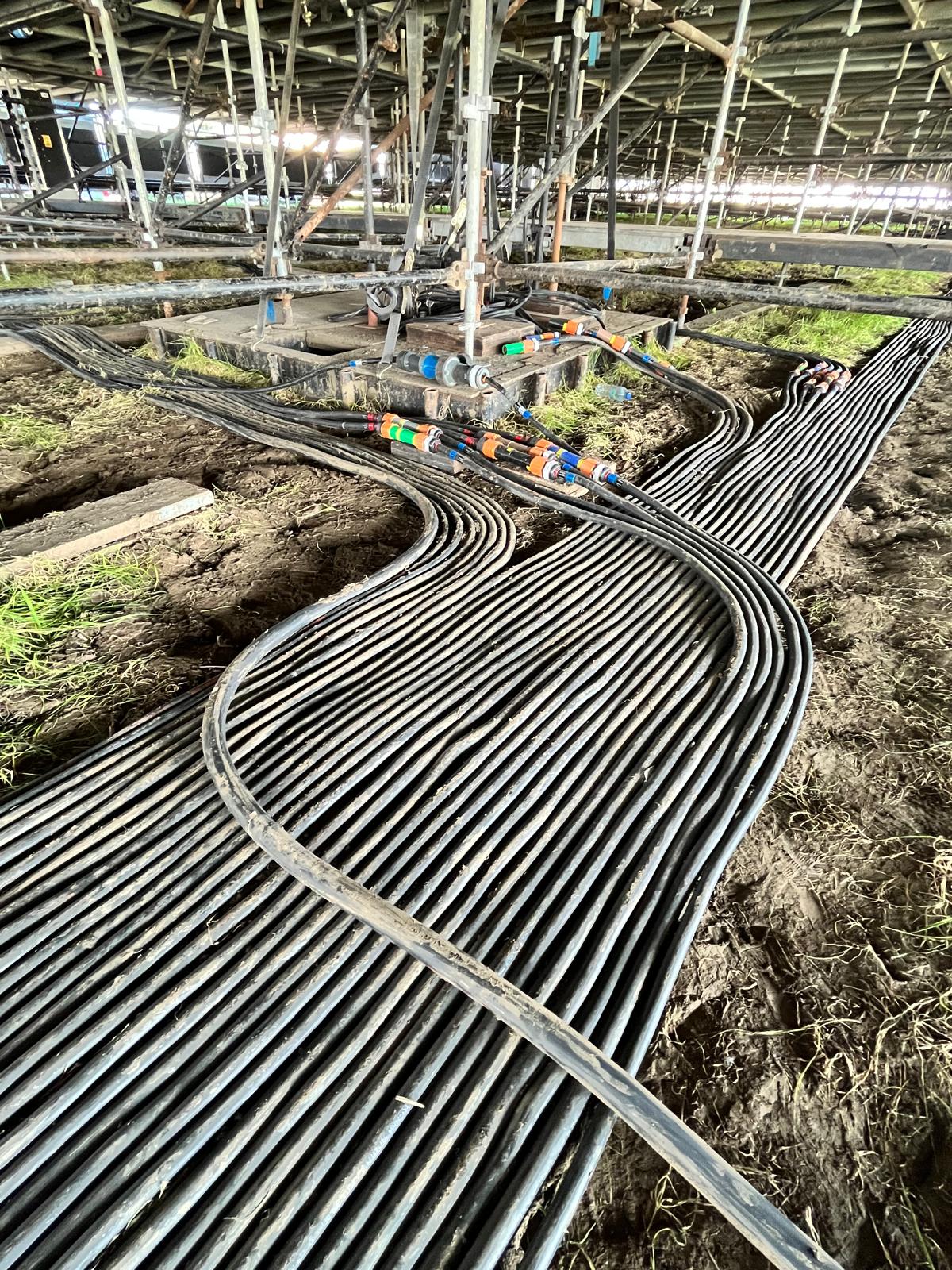 Power cable routes beneath the stage